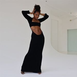 Womens sexy black cutout long sleeve dress Size S NWT